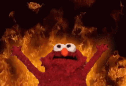 Elmo with his hands up, behind an animated fire background